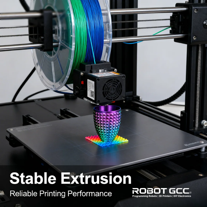 3D printer with colorful object on the bed, featuring ROBOT GCC branding.