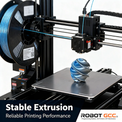 3D printer with blue filament and a printed object, featuring 'Stable Extrusion' text and ROBOTGCC logo.