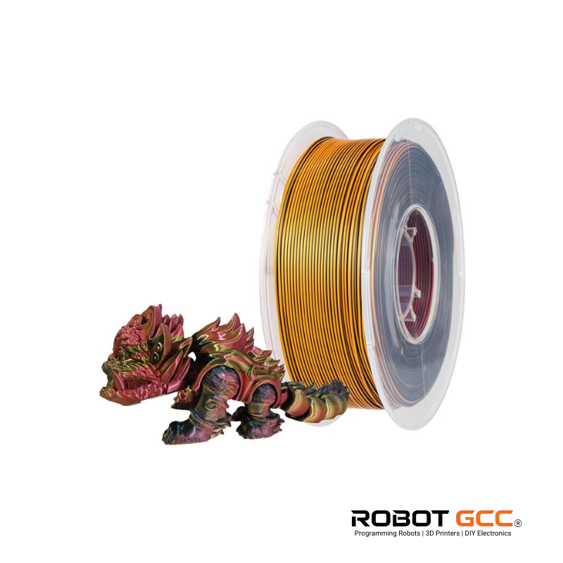 Spool of gold filament next to a small model on a white background with 'Robot GCC' branding.