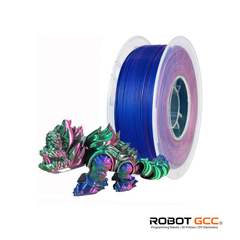 Spool of blue and pink filament with a colorful dragon-like figure on a white background, featuring the brand 'Robot GCC'.